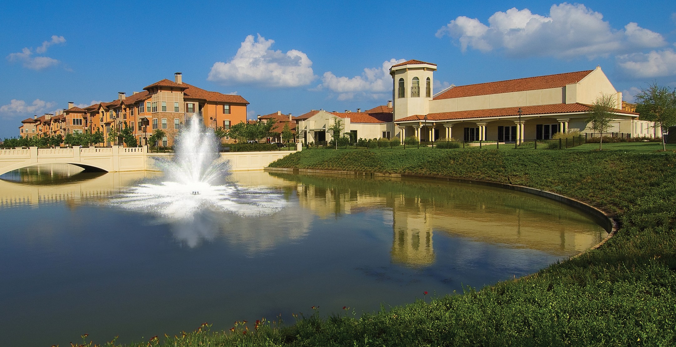 maw-exterior-view-over-pond-retouch-with-fountain.jpg